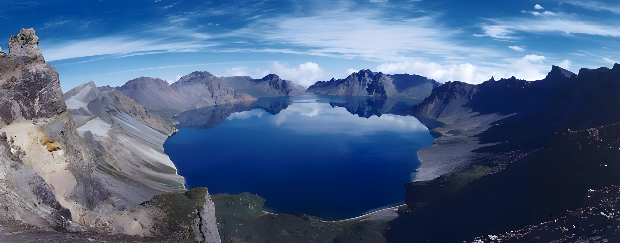 Sunrise breaking through snow-capped peaks of Mount Paektu